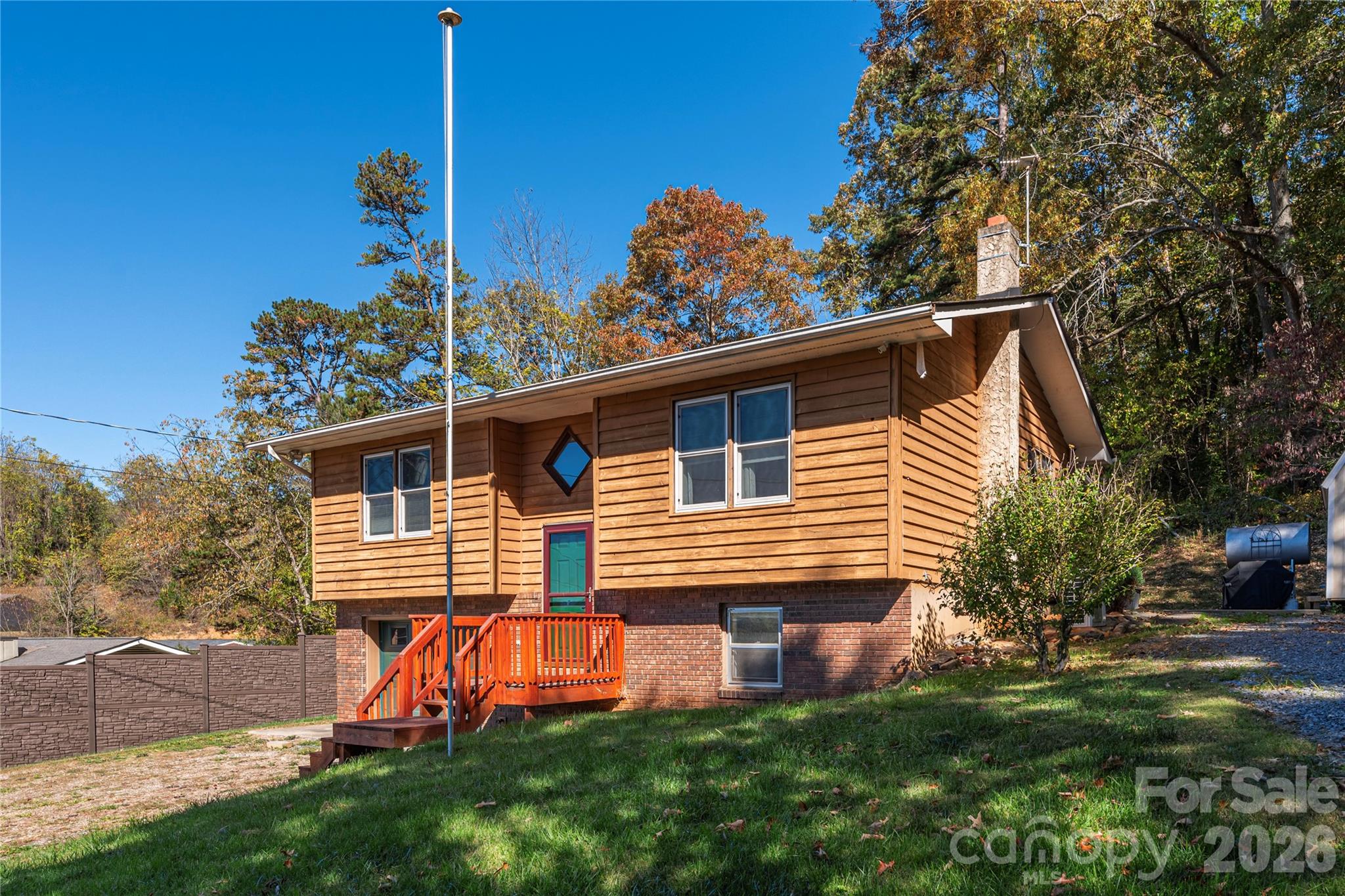 29 Arrowhead Street Clyde, NC 28721 - Photo 1 of 18 a view of a house with a yard