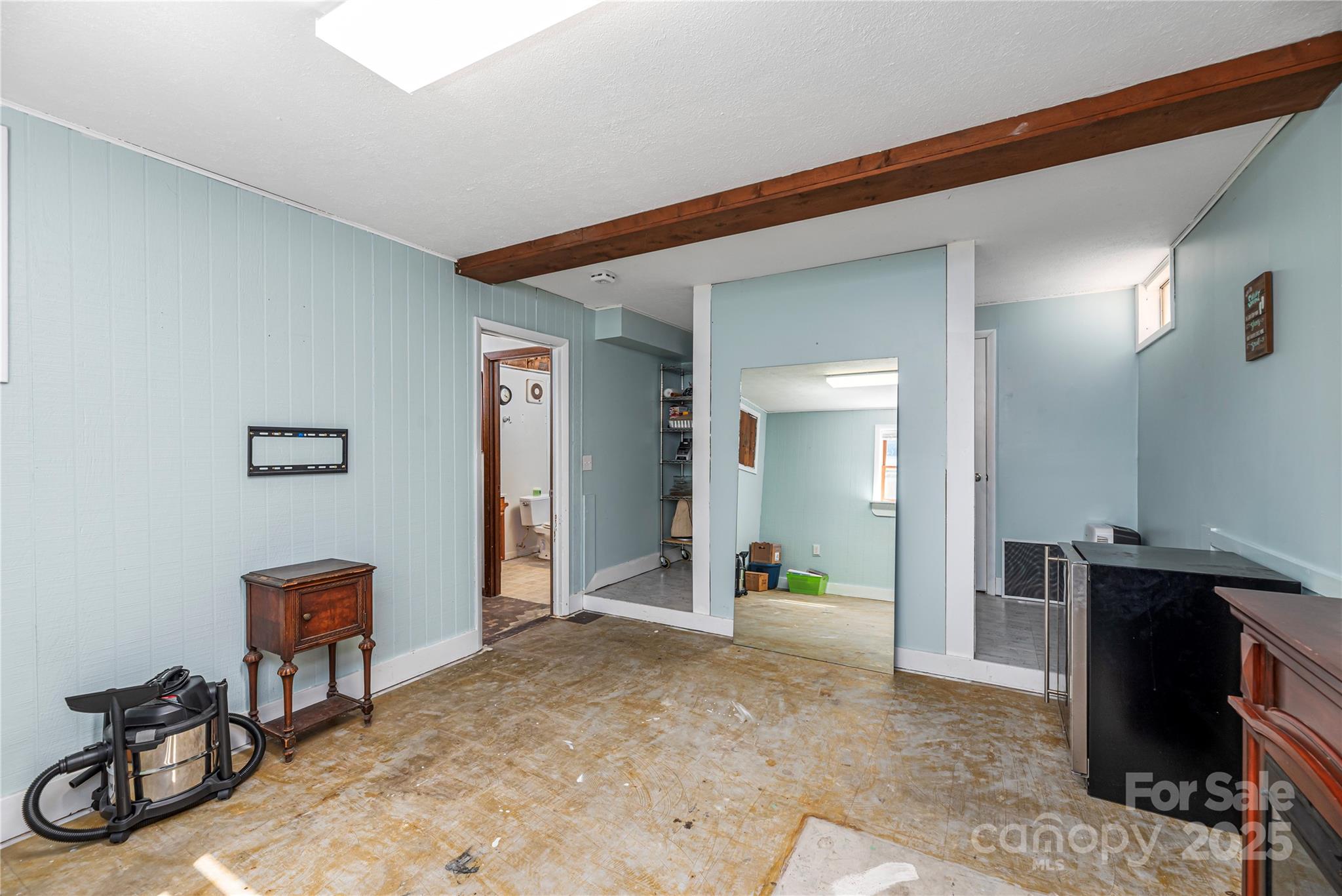 29 Arrowhead Street Clyde, NC 28721 - Photo 12 of 18 a view of a livingroom with a workspace