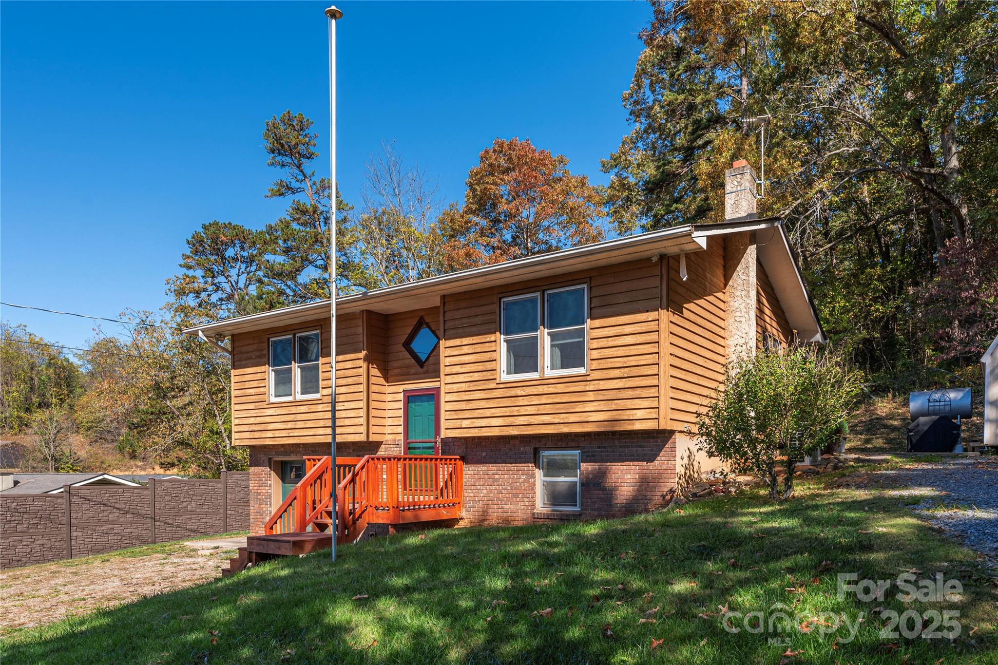 29 Arrowhead Street Clyde, NC 28721 - Photo 2 of 18 a view of a house with a yard