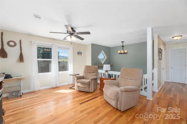 a living room with furniture and window