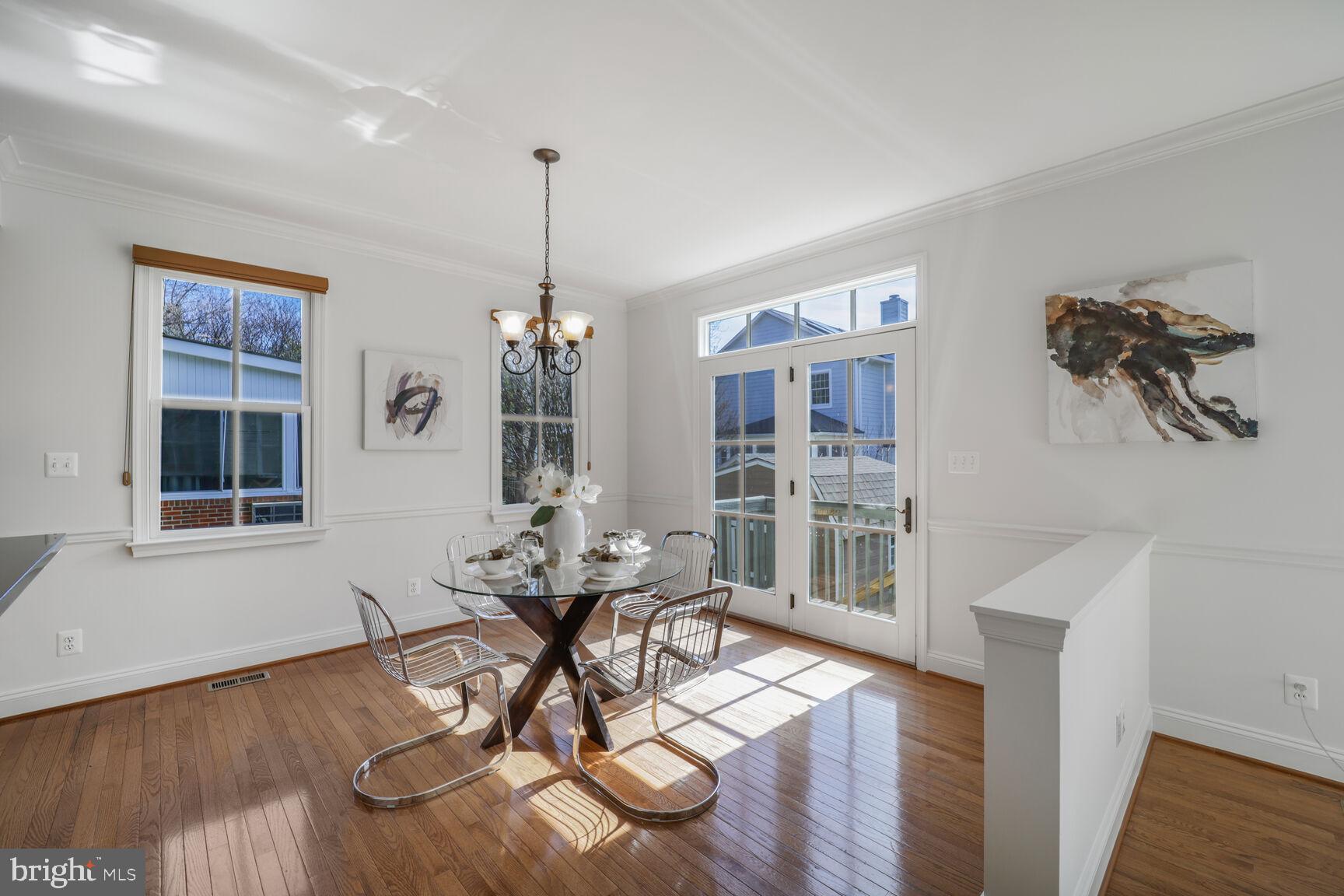 4814 25th Road North Arlington, VA 22207 - Photo 16 of 45 a view of a dining room with furniture window and wooden floor
