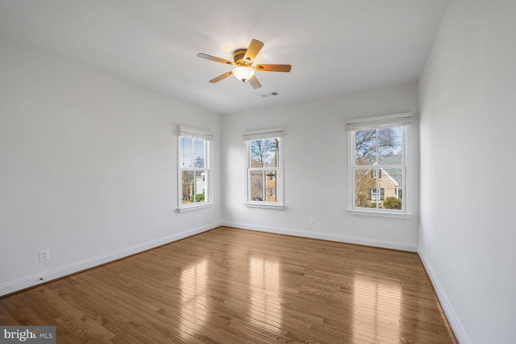 4814 25th Road North Arlington, VA 22207 - Photo 27 of 45 a view of empty room with wooden floor and fan