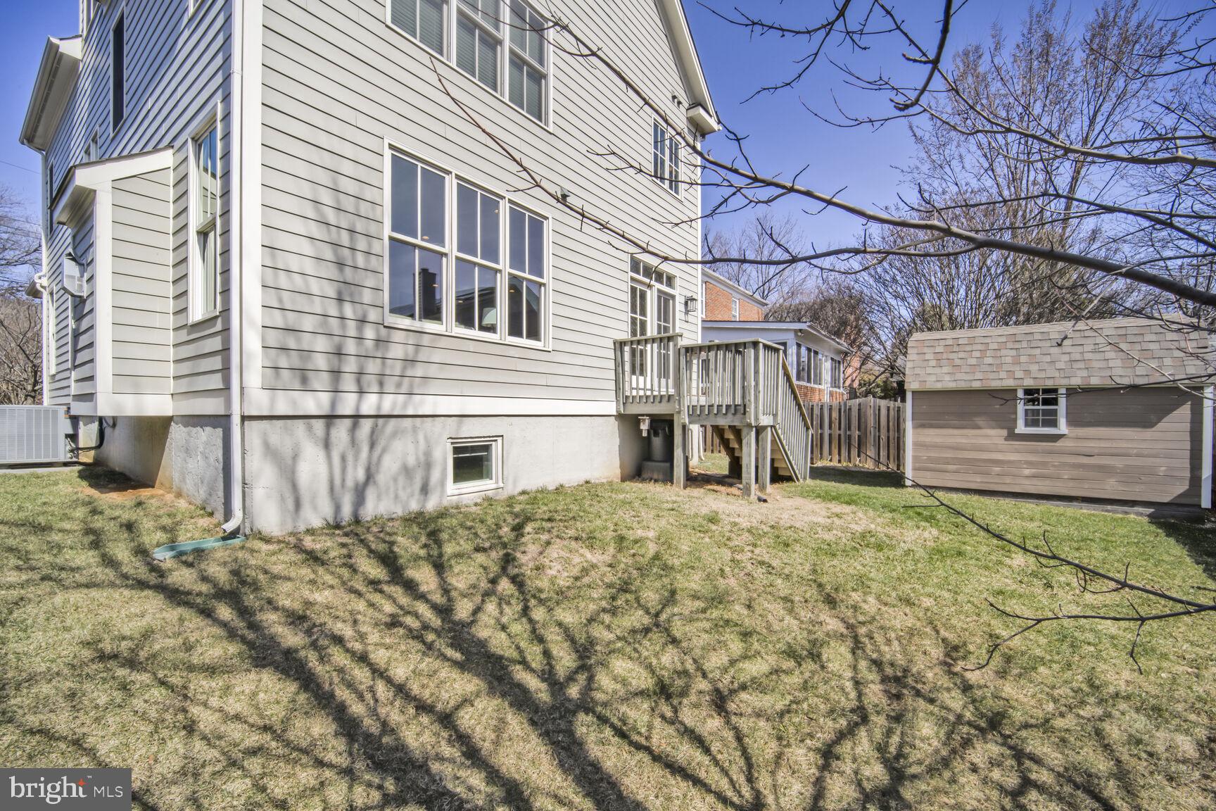 4814 25th Road North Arlington, VA 22207 - Photo 41 of 45 a front view of a house with a yard