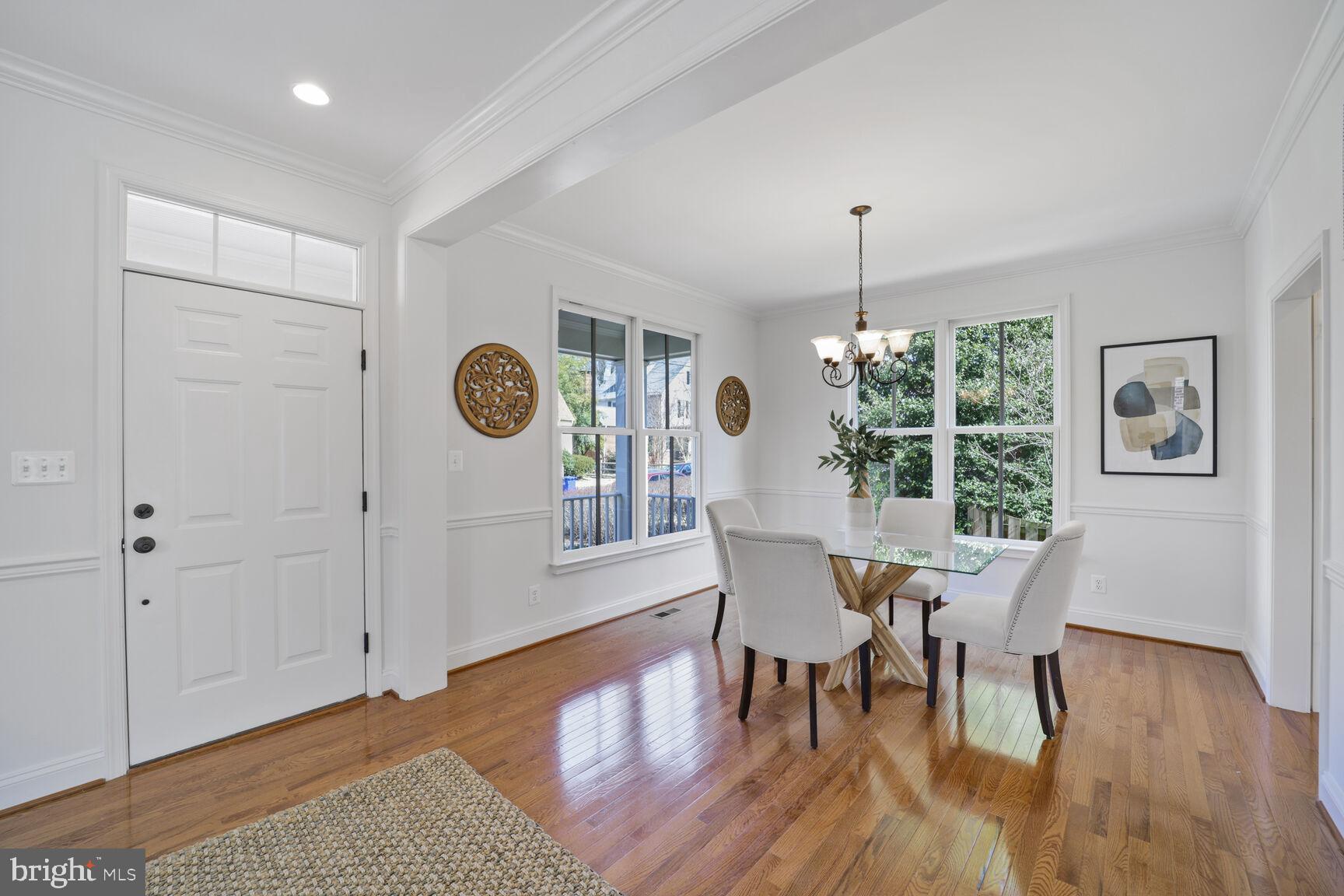 4814 25th Road North Arlington, VA 22207 - Photo 7 of 45 a view of a dining room with furniture window and wooden floor