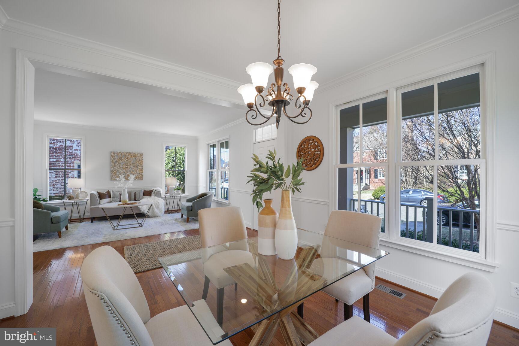 4814 25th Road North Arlington, VA 22207 - Photo 9 of 45 a view of a dining room with furniture wooden floor and chandelier