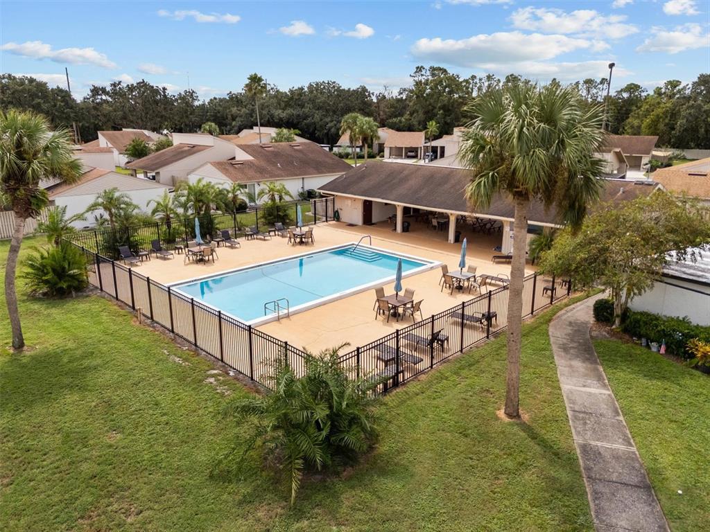 4078 Oak Loop Mulberry, FL 33860 - Photo 13 of 19 an aerial view of residential houses with outdoor space and trees