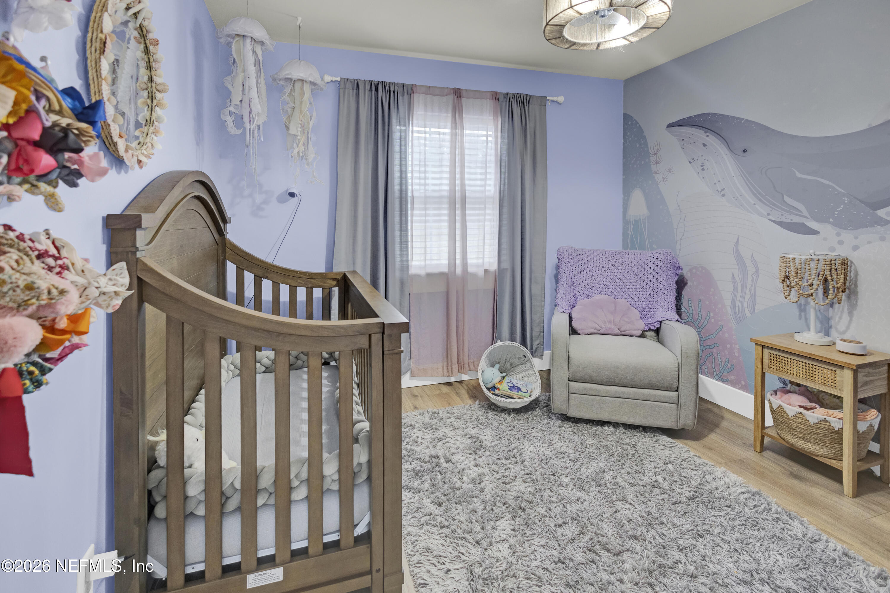 1387 Heath Road Green Cove Springs, FL 32043 - Photo 105 of 136 a living room with furniture and a window