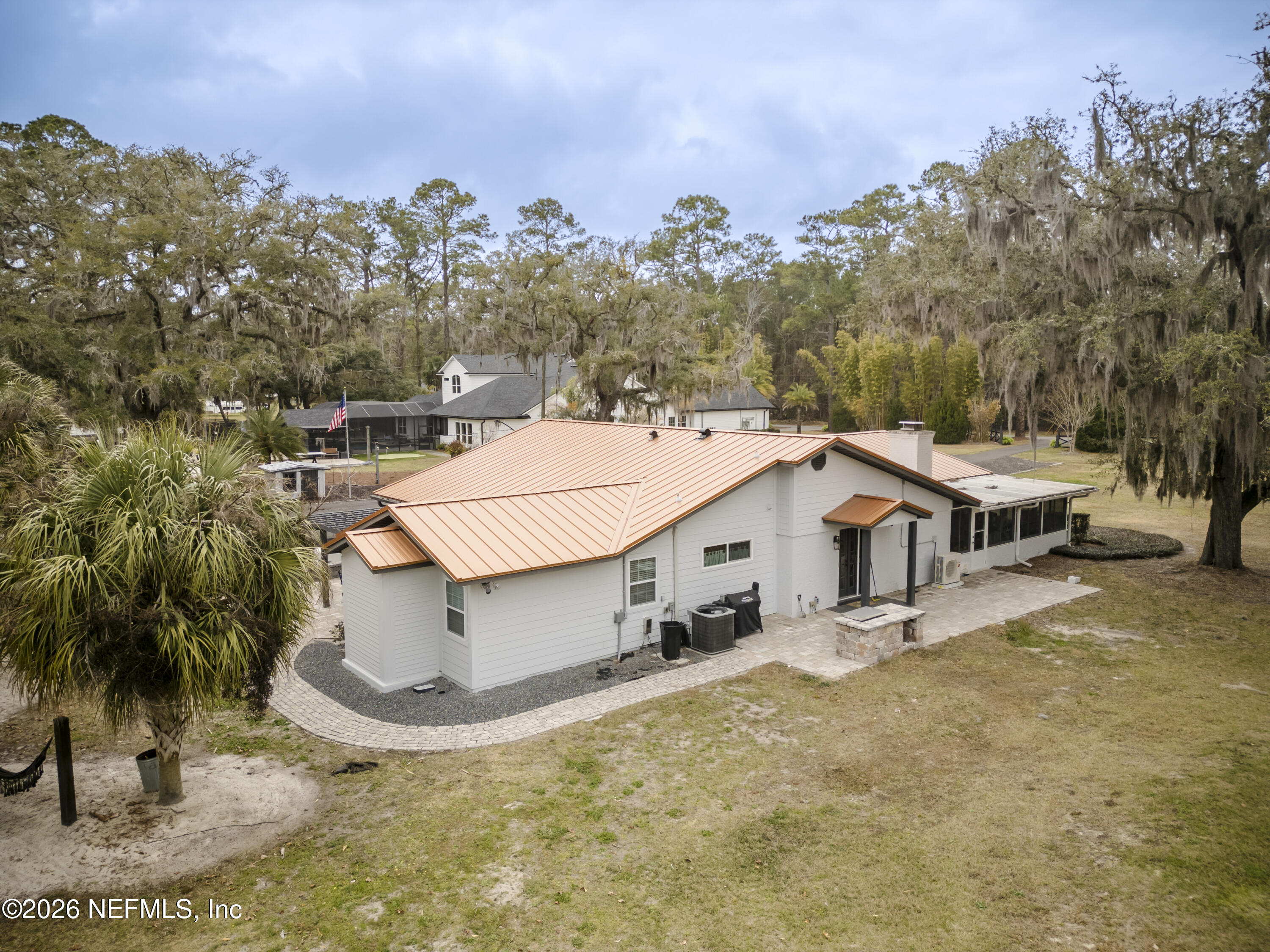 1387 Heath Road Green Cove Springs, FL 32043 - Photo 109 of 136 an aerial view of a house with a yard basket ball court and outdoor seating