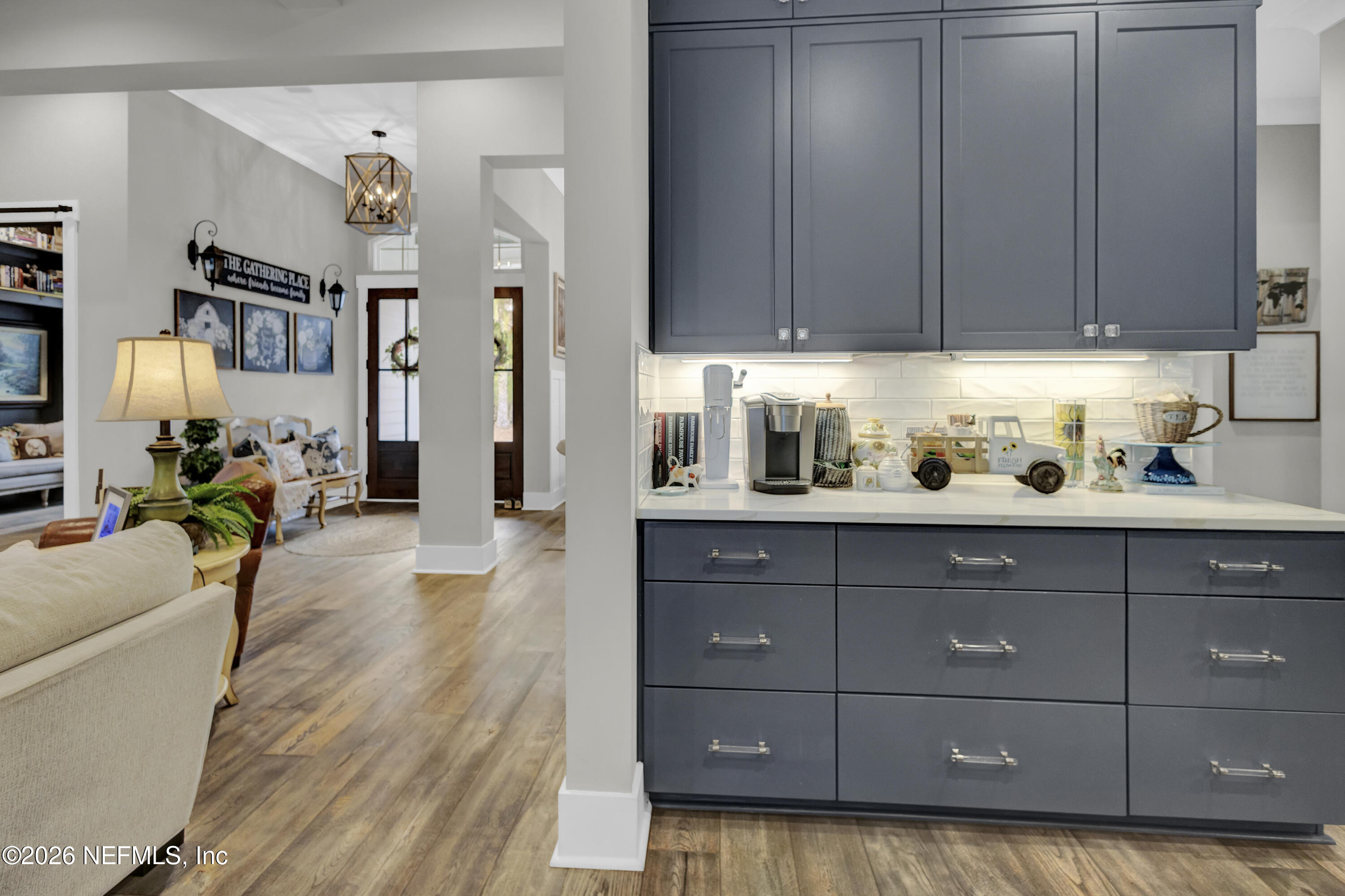 1387 Heath Road Green Cove Springs, FL 32043 - Photo 26 of 136 a kitchen with a cabinets and wooden floor