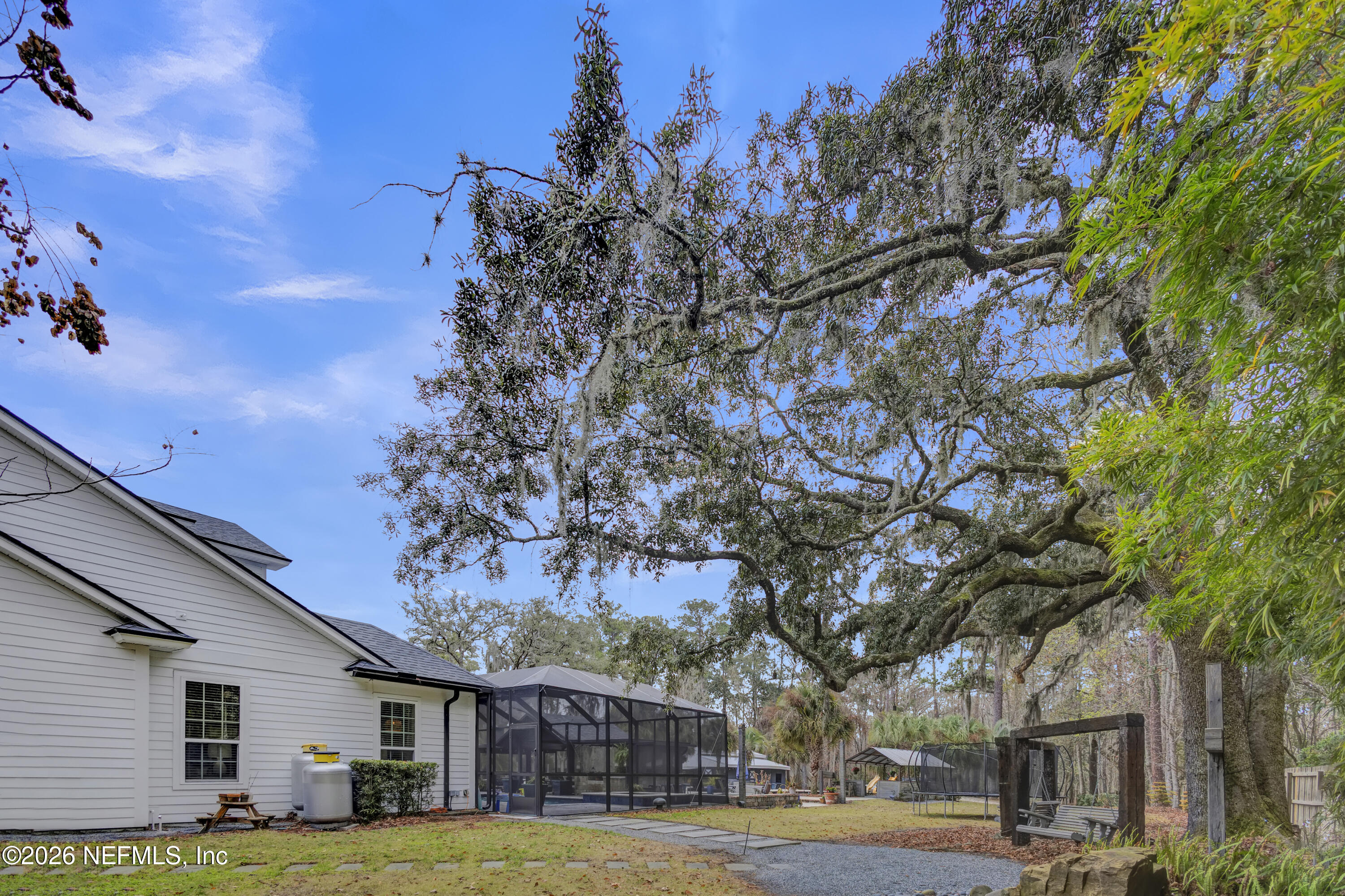 1387 Heath Road Green Cove Springs, FL 32043 - Photo 71 of 136 a view of a yard in front of a building
