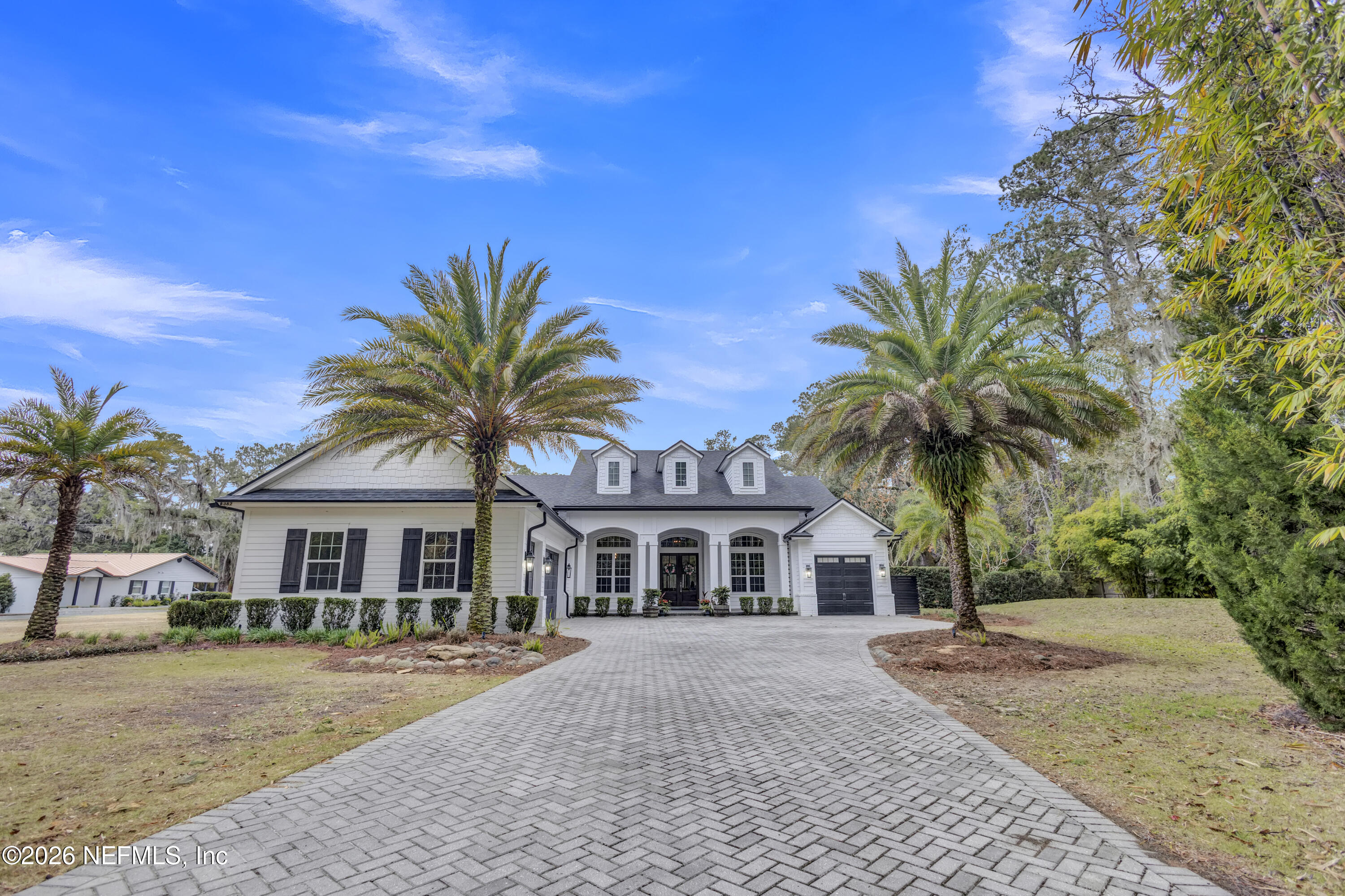 1387 Heath Road Green Cove Springs, FL 32043 - Photo 9 of 136 front view of a house with a yard