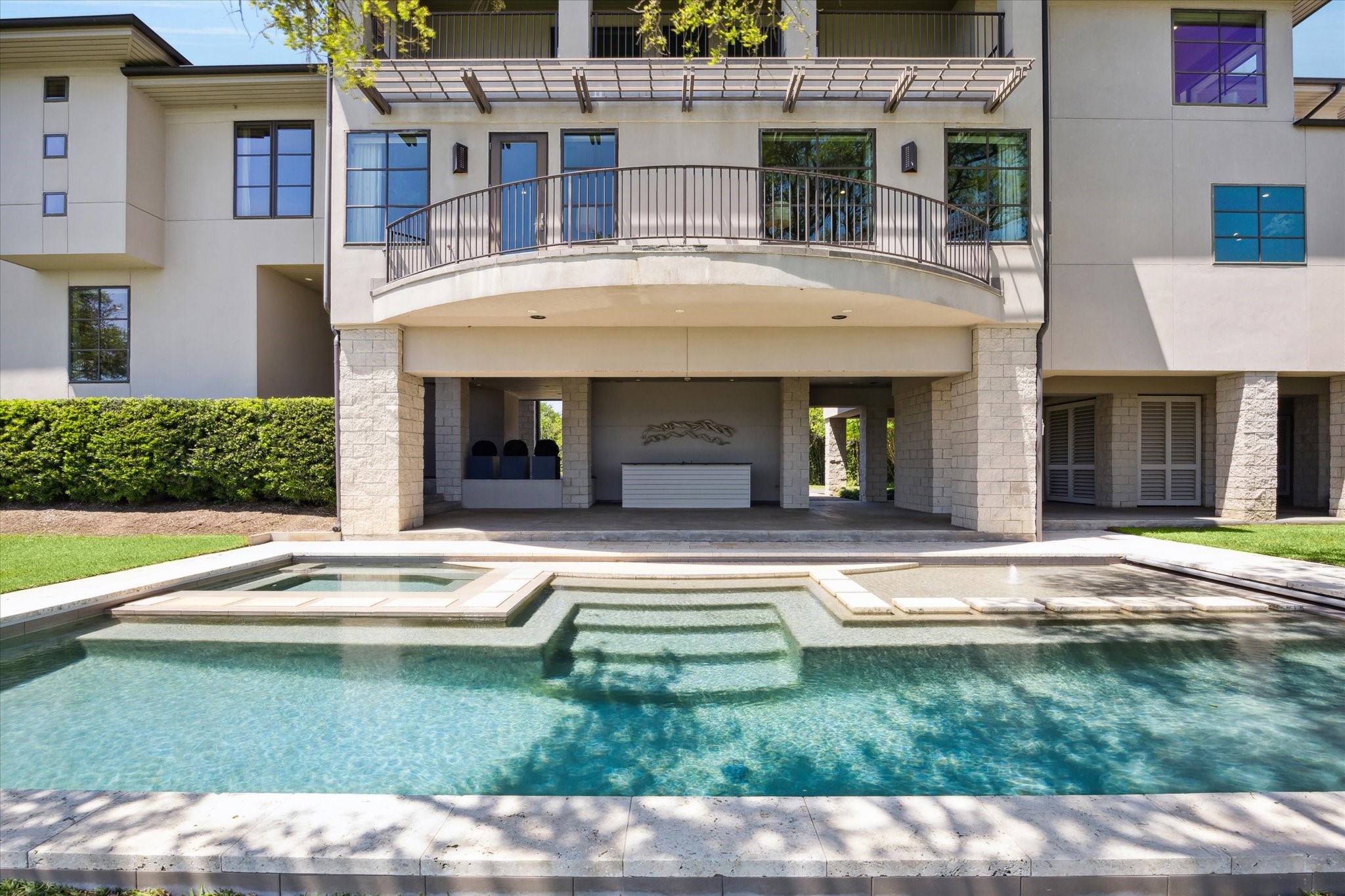 633 Quintana Roo Place Seabrook, TX 77586 - Photo 7 of 47 Exterior balconies on every floor of this home offer sweeping views of the bay and grounds.