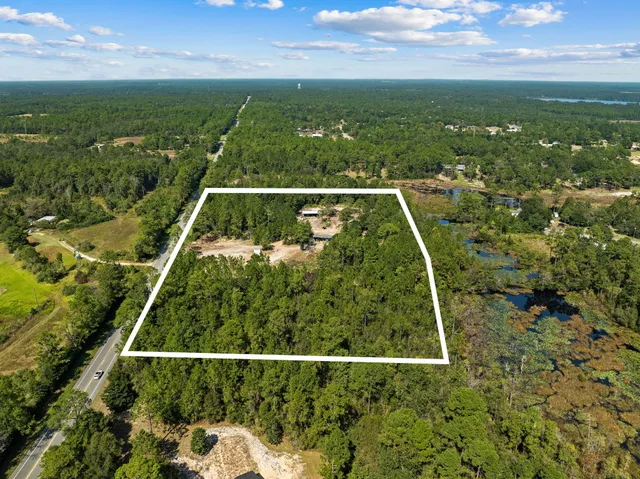 a view of a lake with a city