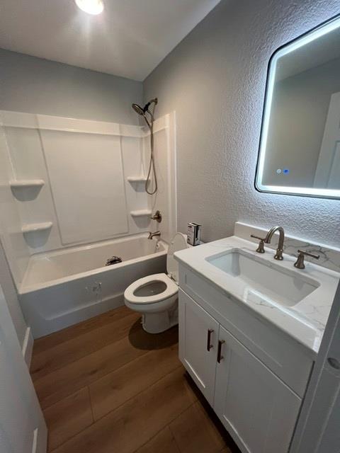 1616 Abe Cove Road Hiawassee, GA 30546 - Photo 15 of 17 a bathroom with a toilet sink and mirror