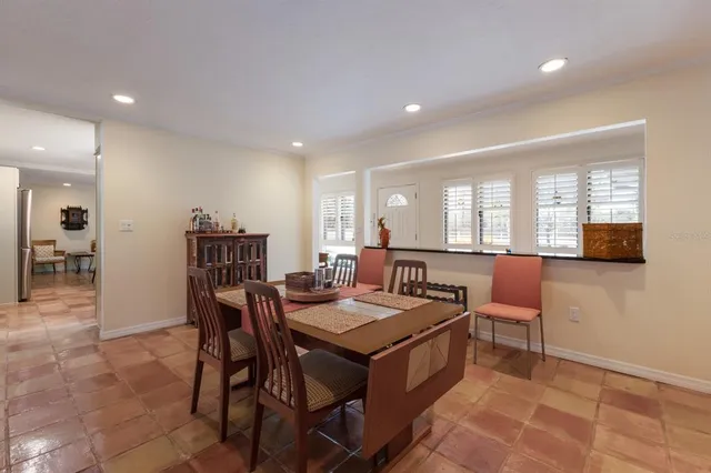 a kitchen with a stove cabinets and stainless steel appliances