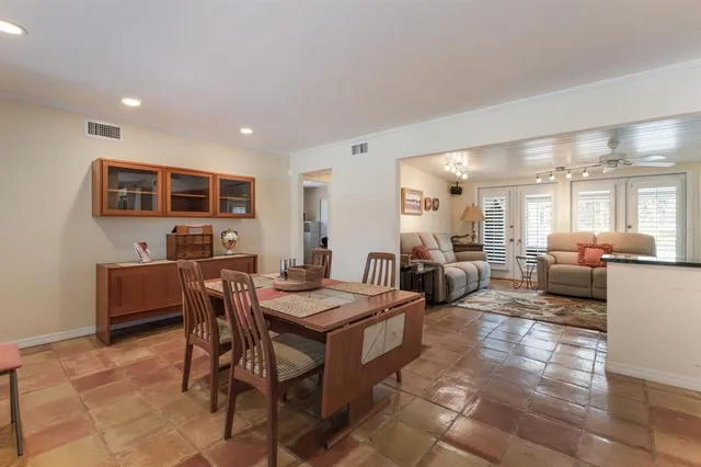 a view of a livingroom with furniture and window