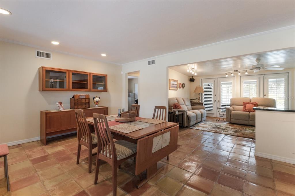 2723 59th Street Sarasota, FL 34243 - Photo 16 of 75 a view of a dining room with furniture