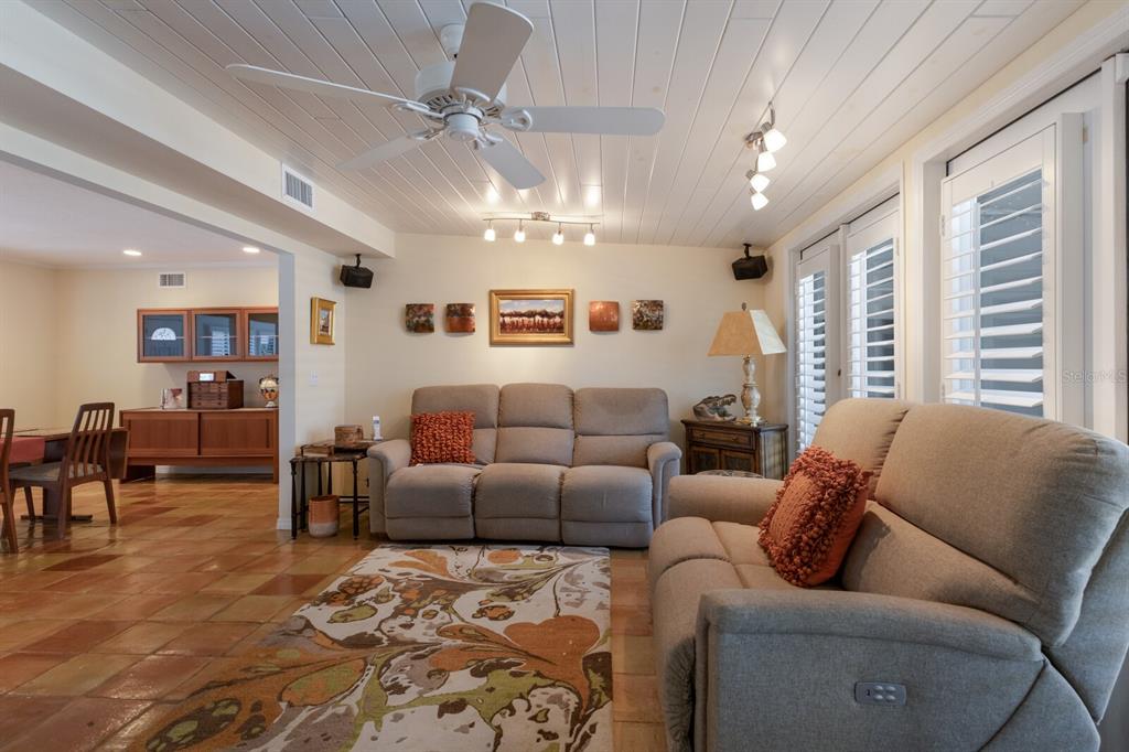 2723 59th Street Sarasota, FL 34243 - Photo 18 of 75 a living room with furniture and a large window