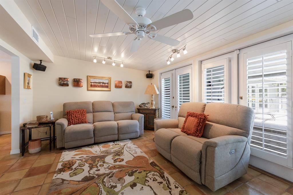 2723 59th Street Sarasota, FL 34243 - Photo 21 of 75 a living room with furniture and a large window