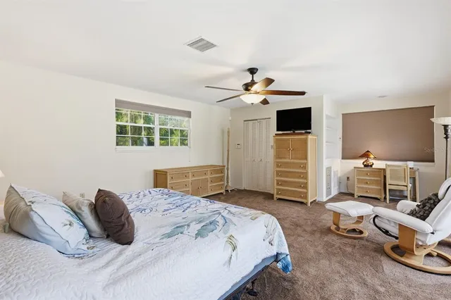 a view of livingroom with furniture and windows