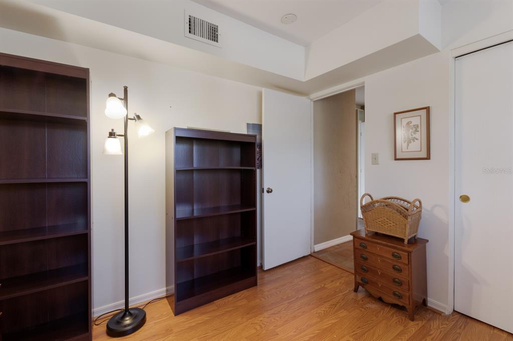 2723 59th Street Sarasota, FL 34243 - Photo 42 of 75 a room with chair and closet