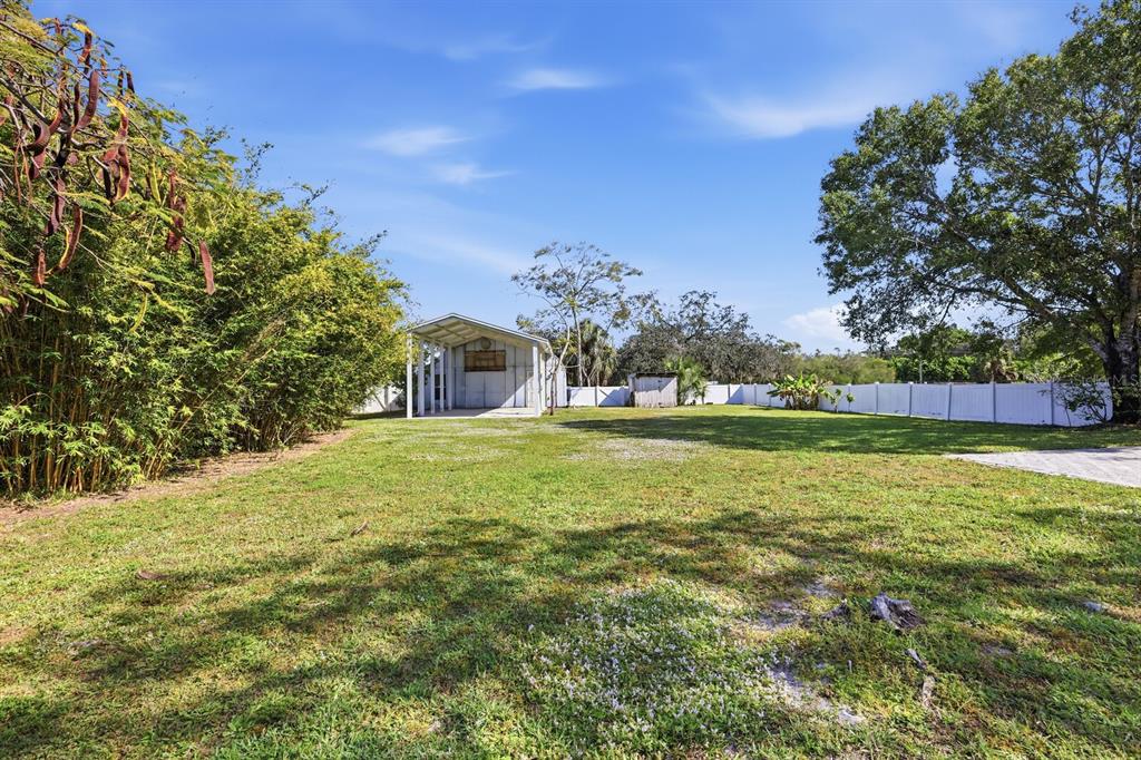 2723 59th Street Sarasota, FL 34243 - Photo 56 of 75 a house view with swimming pool in front of it