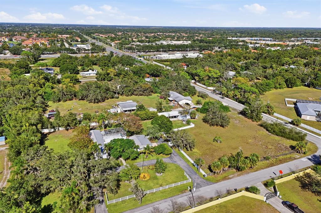 2723 59th Street Sarasota, FL 34243 - Photo 68 of 75 an aerial view of residential houses with outdoor space
