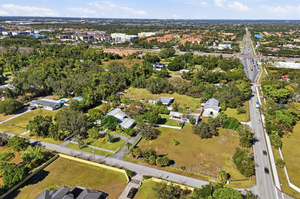 2723 59th Street Sarasota, FL 34243 - Photo 69 of 75 an aerial view of residential houses with outdoor space