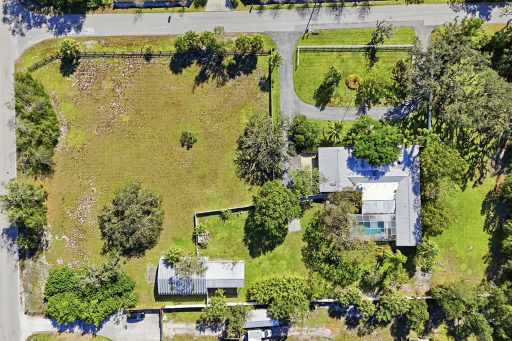 2723 59th Street Sarasota, FL 34243 - Photo 7 of 75 an aerial view of a residential apartment building with a yard