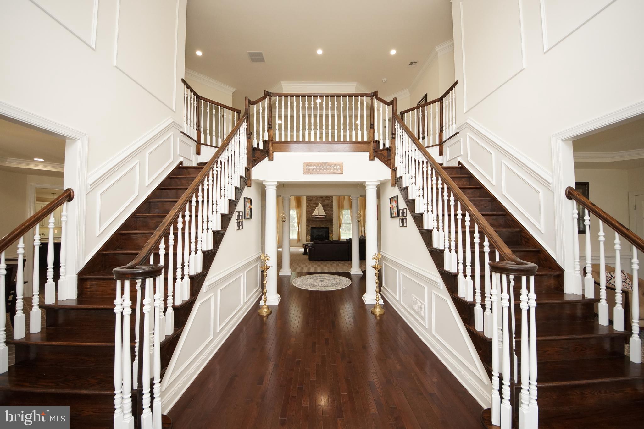 5 Harness Court Cream Ridge, NJ 08514 - Photo 20 of 71 Dual Butterfly staircase accented w/custom molding