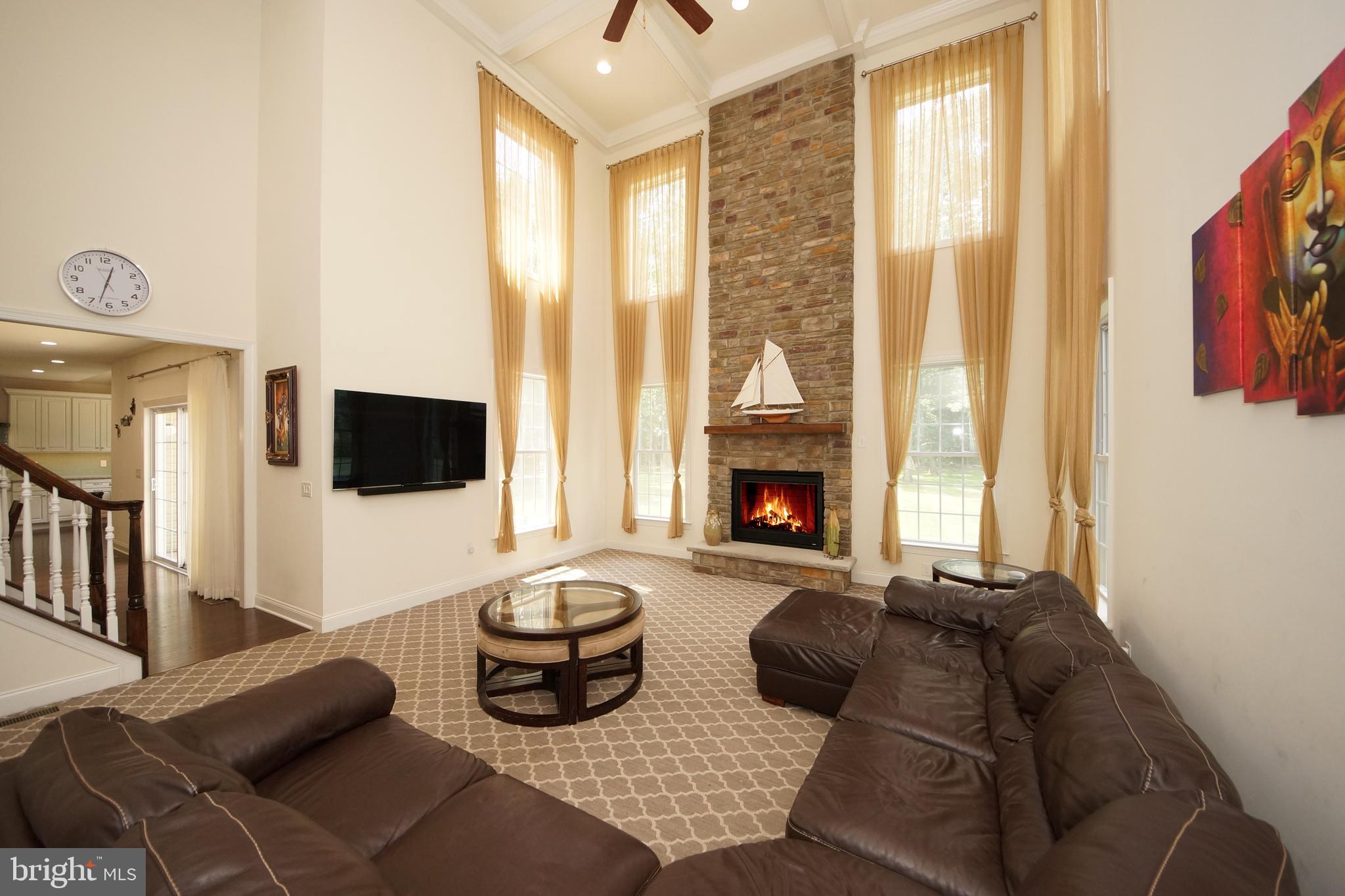 5 Harness Court Cream Ridge, NJ 08514 - Photo 40 of 71 Gathering room with floor to ceiling stone gas F/P