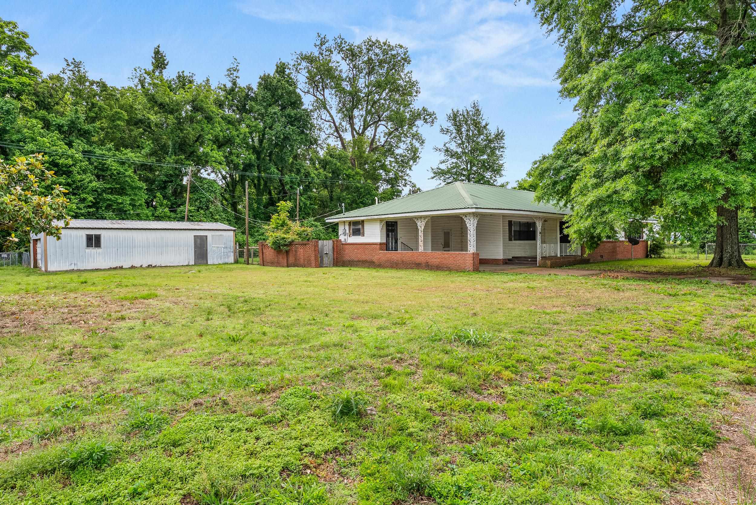 61 Bridge Road Coahoma, MS 38617 - Photo 21 of 27 a view of a house with a yard