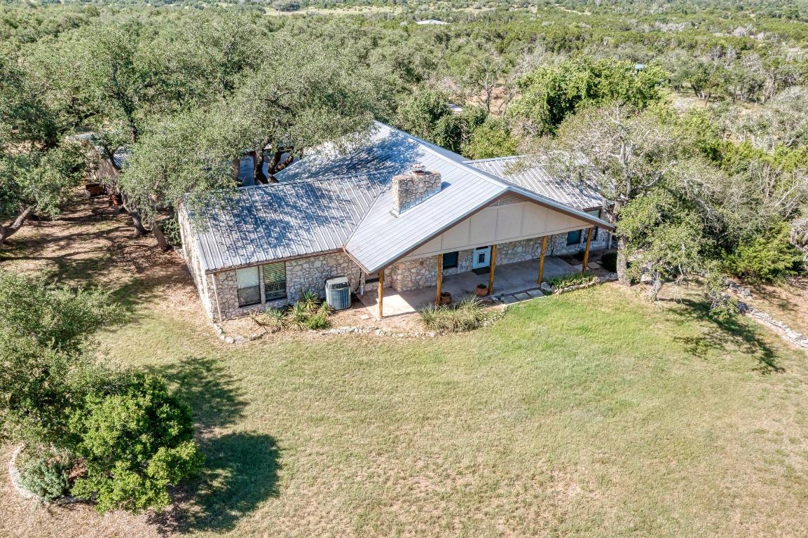 200 Shelton Ranch Road Dripping Springs, TX 78620 - Photo 1 of 1 a view of a house with a yard