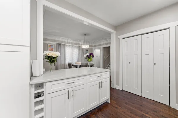 a kitchen with a sink and cabinets