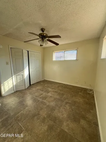 a bathroom with a toilet sink and shower