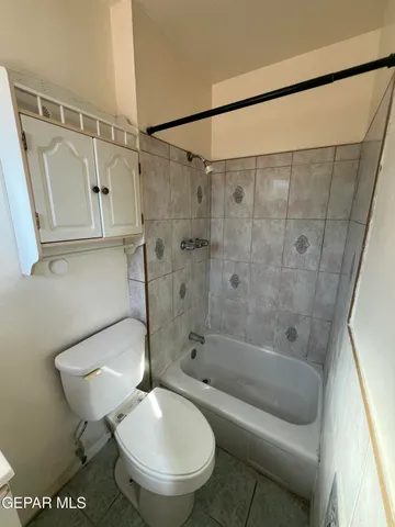 a view of a backyard of the house