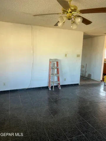 a view of hallway with stainless steel appliances
