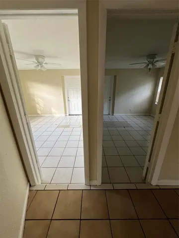 a view of a living room and bathroom