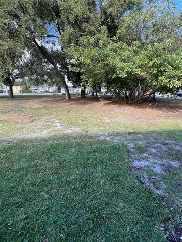 a view of yard with porch