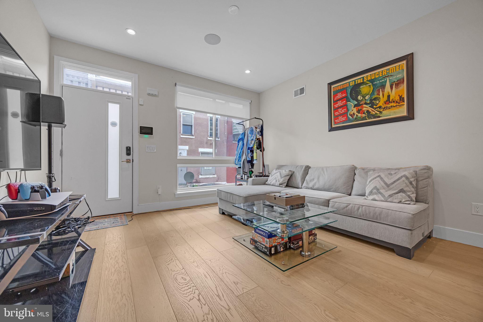1752 North Bailey Street Philadelphia, PA 19121 - Photo 4 of 30 a living room with furniture and a wooden floor
