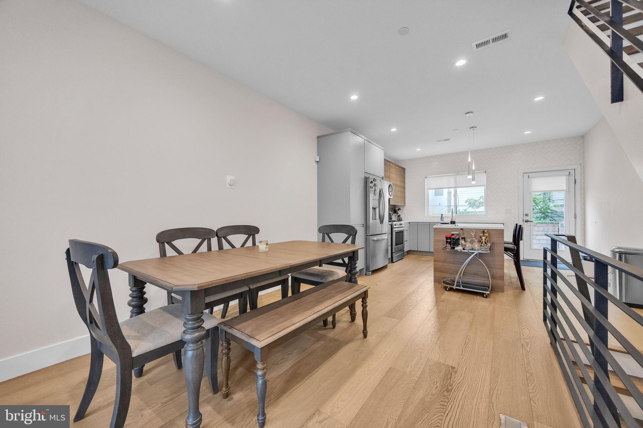 1752 North Bailey Street Philadelphia, PA 19121 - Photo 8 of 30 a outdoor space with furniture and lots of wooden furniture
