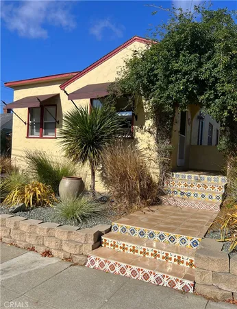 a view of a backyard of the house