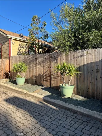 a view of a back yard of the house
