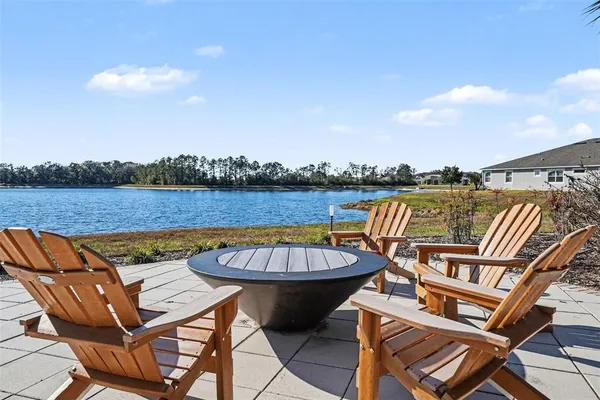 a view of a swimming pool with lounge chair