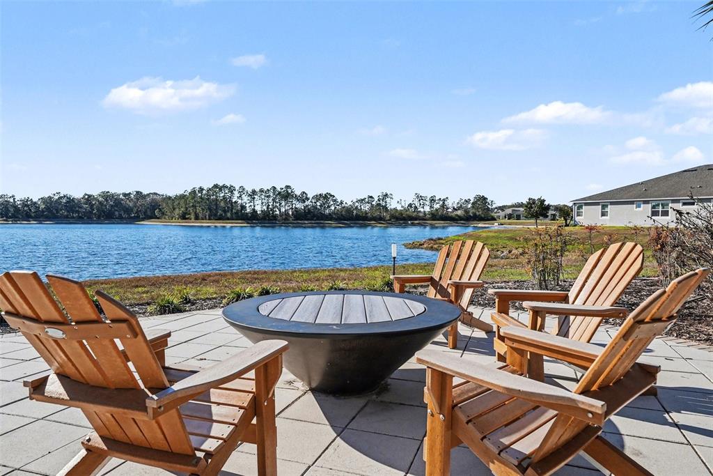 10210 Newel Valley Loop Riverview, FL 33569 - Photo 29 of 30 a view of a swimming pool with lounge chair