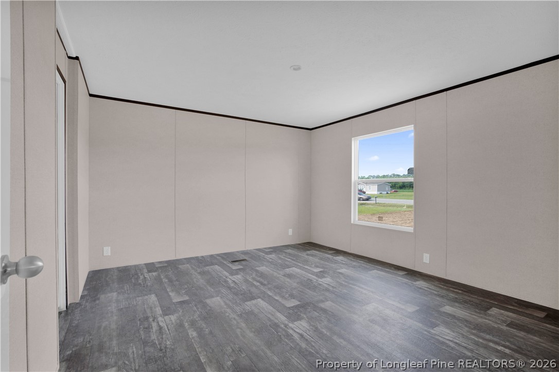 6309 Deep Branch Road Pembroke, NC 28372 - Photo 16 of 32 a view of an empty room with a window