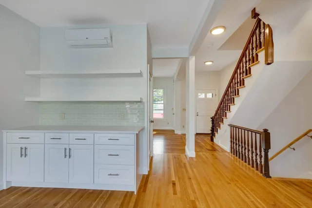a view of entryway with wooden floor