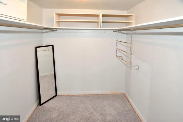 a view of a room with racks on the wall