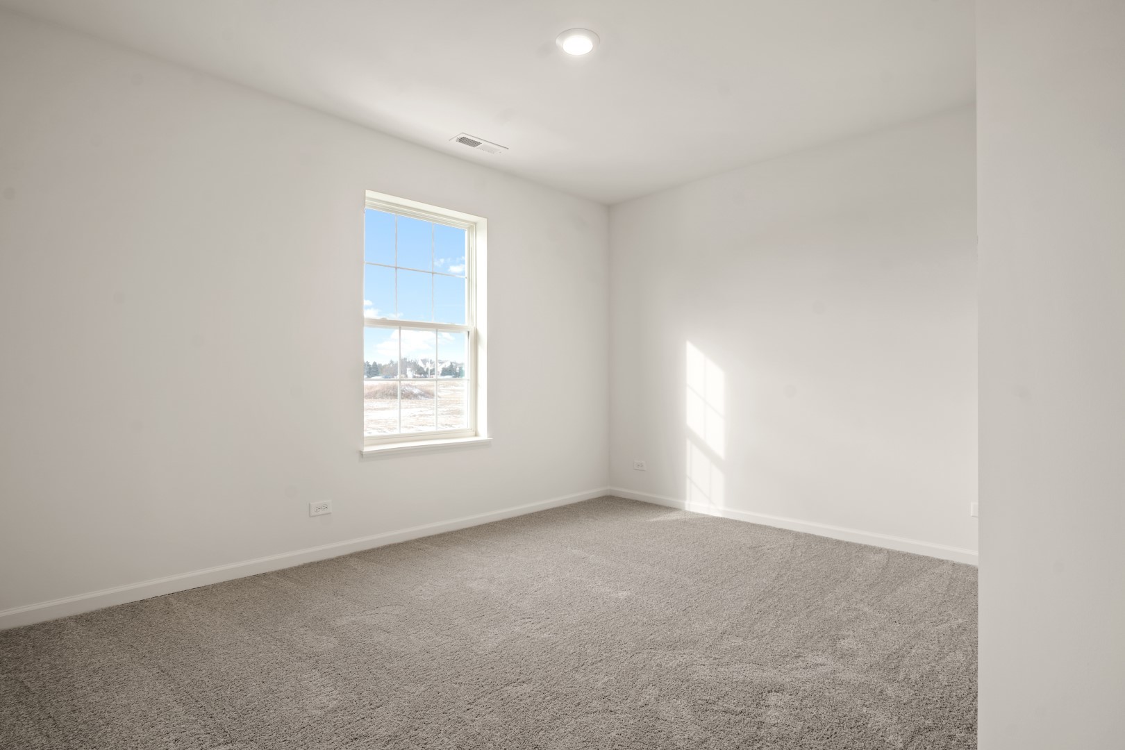 2057 Stuttle Road Batavia, IL 60510 - Photo 16 of 20 an empty room with a window