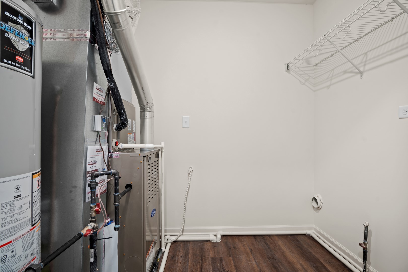 2057 Stuttle Road Batavia, IL 60510 - Photo 19 of 20 a view of storage and utility room with wooden floor